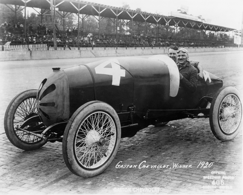 Gaston Chevrolet sits with Johnny Bresnahan in his race car during a practice day prior to the 1920 Indianapolis 500. Photo credit: IMS via AP